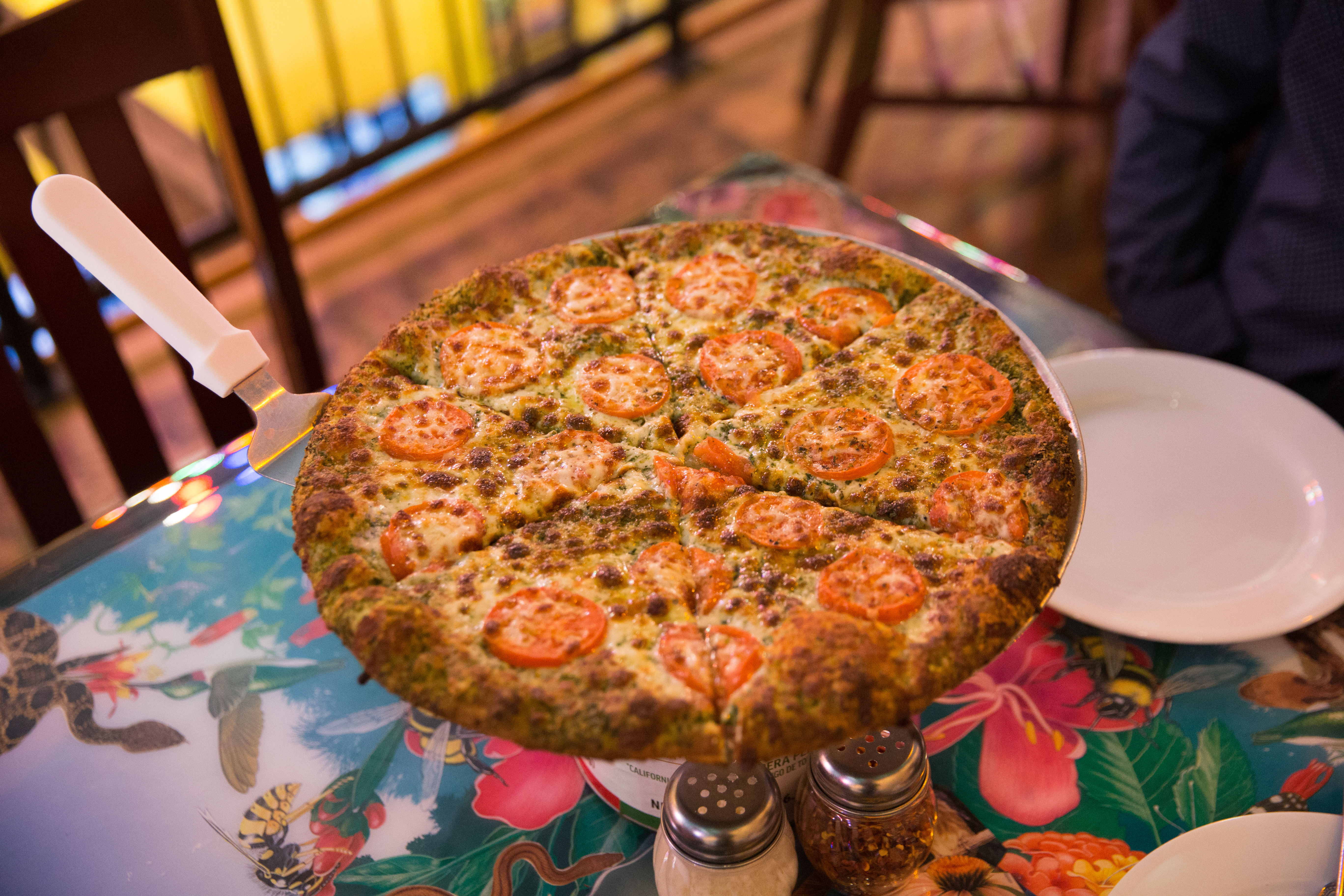 Pesto, olive oil, garlic, tomatoes, mozzarella pizza from from Sam & Greg's in Huntsville, Al